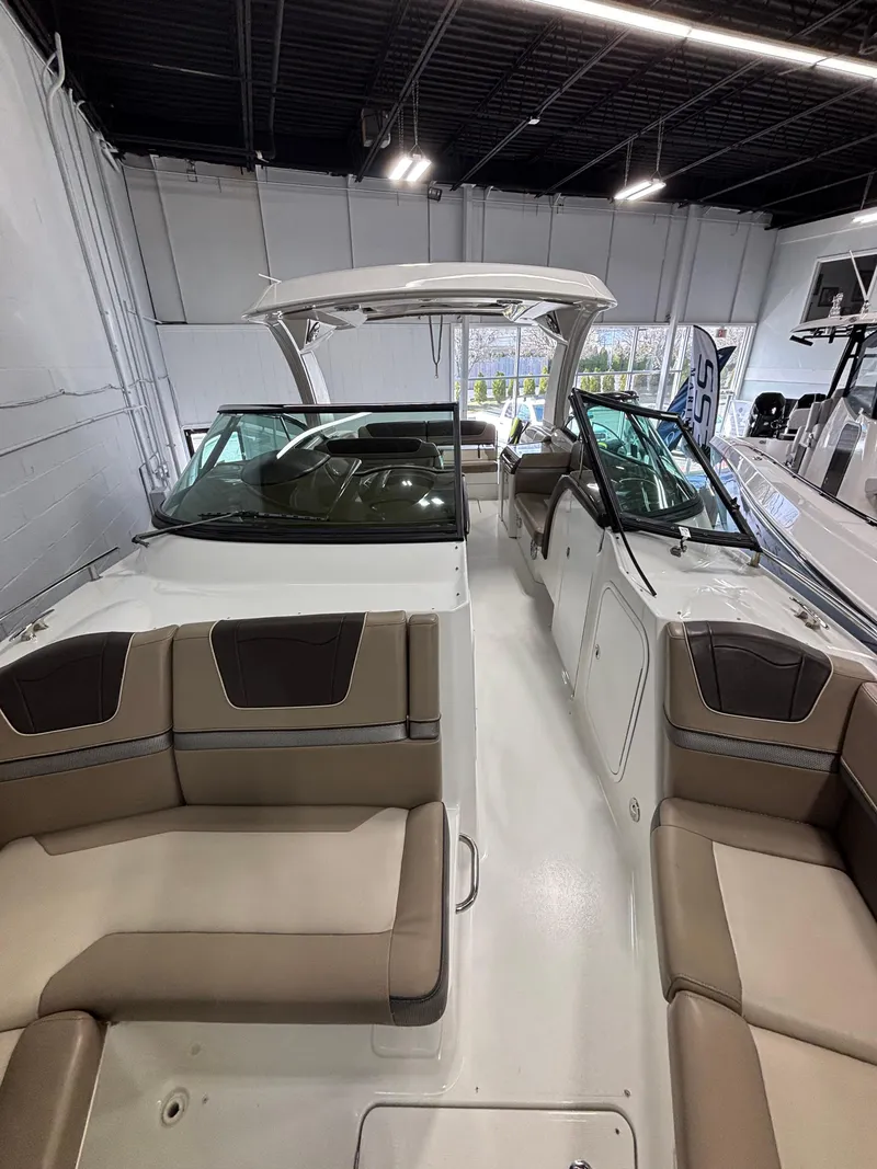 Slide: The Image of 2019 Formula 350 Crossover Bowrider I/O with spacious seating in showroom. - 18