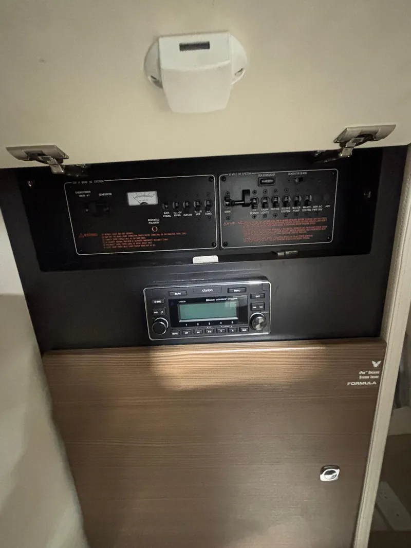 Slide: The Image of Control panel of 2019 Formula 350 Crossover Bowrider I/O boat interior. - 23