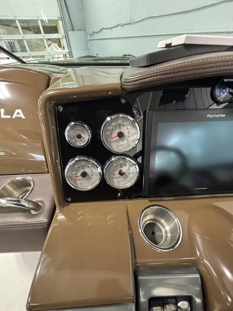 Slide: The Image of Dashboard of 2019 Formula 350 Crossover Bowrider I/O with gauges and touchscreen display. - 26