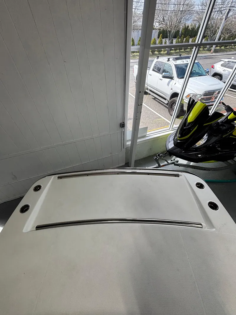 Slide: The Image of 2019 Formula 350 Crossover Bowrider I/O boat interior with window view. - 31