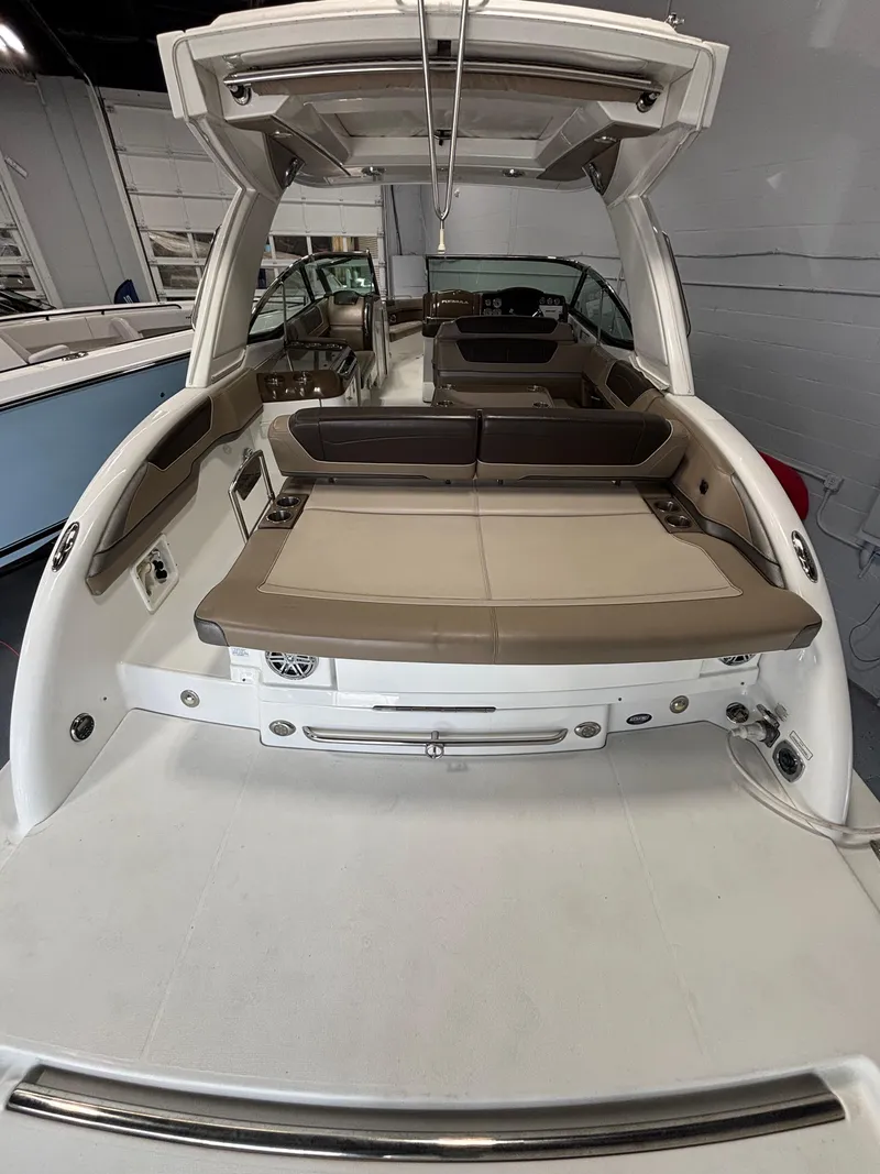 Slide: The Image of 2019 Formula 350 Crossover Bowrider I/O, spacious deck with seating, modern design. - 4