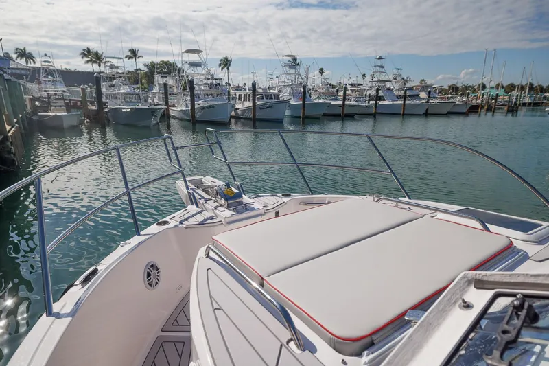 Slide: The Image of Bow view of 2026 Solara S-310 SB yacht docked at marina. - 15