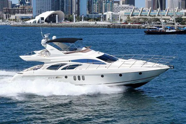 The Image of Luxury 2007 Azimut 62 yacht cruising in urban waterfront setting. - 0