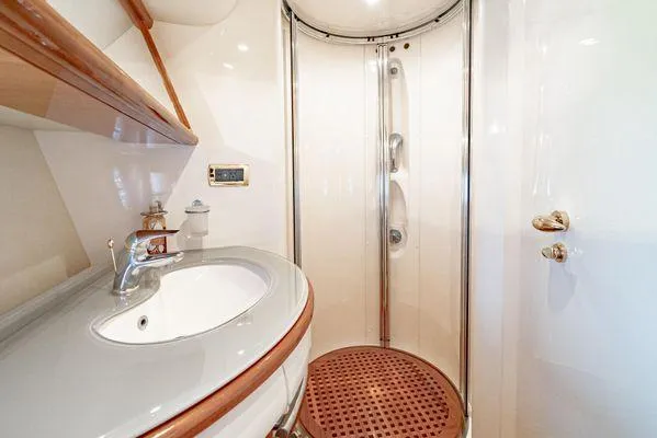 Slide: The Image of Luxurious bathroom in 2007 Azimut 62 yacht with modern shower and sink. - 43