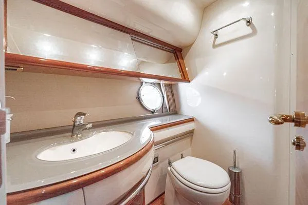 Slide: The Image of Luxurious bathroom in 2007 Azimut 62 yacht with modern fixtures and elegant design. - 47
