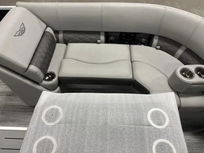 Slide: The Image of Luxurious seating on 2025 Bennington 23LFB boat with cup holders and quilted upholstery. - 8