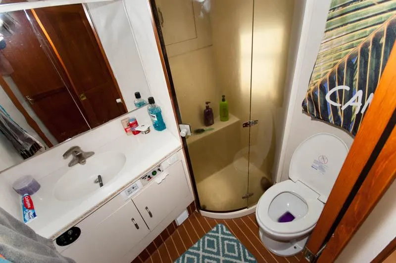 Slide: The Image of Bathroom interior of 1991 Ocean Yachts 58 Super Sport with shower and toilet. - 17