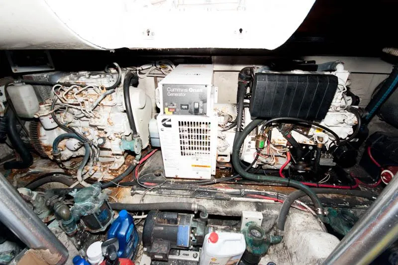 Slide: The Image of Engine room of 1991 Ocean Yachts 58 Super Sport with Cummins diesel generator. - 32
