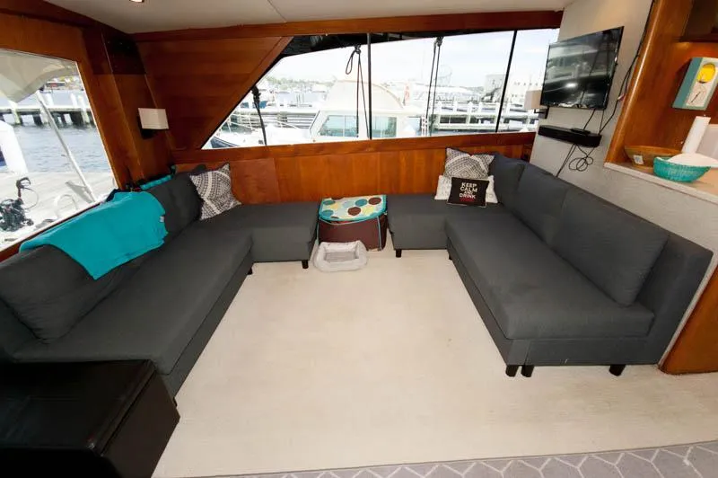 Slide: The Image of Luxurious interior of 1991 Ocean Yachts 58 Super Sport with modern seating and decor. - 6
