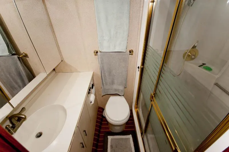 Slide: The Image of Bathroom interior of 1991 Ocean Yachts 58 Super Sport with shower and vanity. - 15