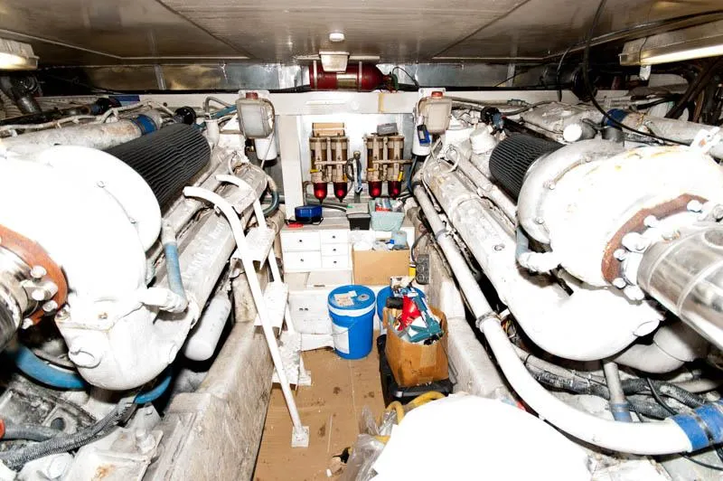 Slide: The Image of Engine room of 1991 Ocean Yachts 58 Super Sport with dual engines and equipment. - 35