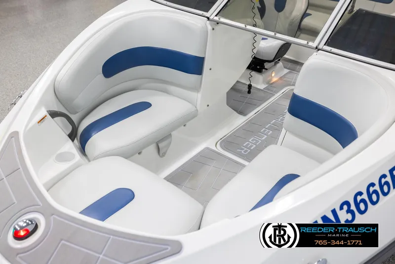 Slide: The Image of 2007 Sea-Doo 180 Challenger interior with white and blue seating, showcasing sleek design. - 10