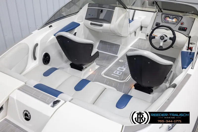 Slide: The Image of 2007 Sea-Doo 180 Challenger interior with seating and dashboard view. - 12