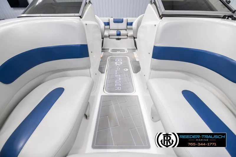 Slide: The Image of 2007 Sea-Doo 180 Challenger interior with blue and white seating, showcasing spacious design. - 16