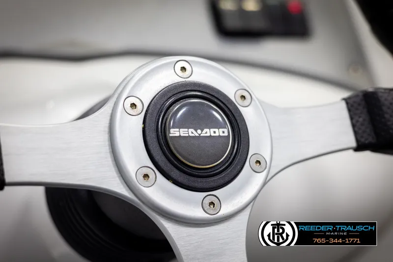 Slide: The Image of Steering wheel of 2007 Sea-Doo 180 Challenger boat, close-up view. - 31