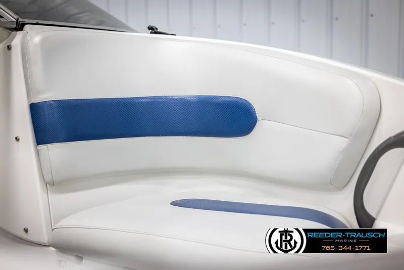 Slide: The Image of 2007 Sea-Doo 180 Challenger interior with white and blue seating. - 38