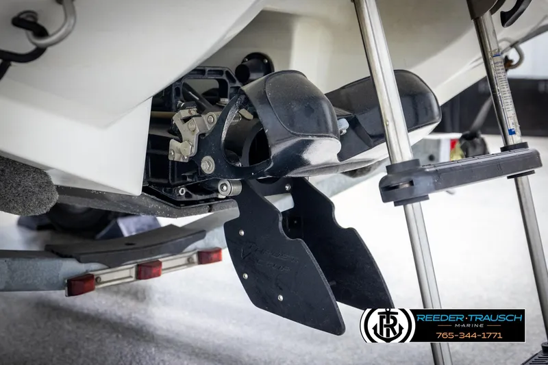 Slide: The Image of 2007 Sea-Doo 180 Challenger boat underside with steering mechanism and trailer. - 48