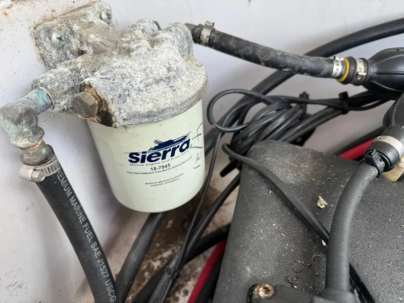 Slide: The Image of Fuel filter system in a 1996 Boston Whaler Outrage 17 boat. - 19