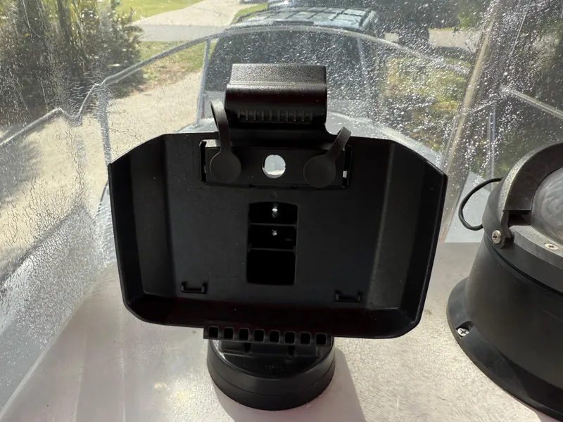 Slide: The Image of 1996 Boston Whaler Outrage 17 dashboard with a black electronic device mount. - 32