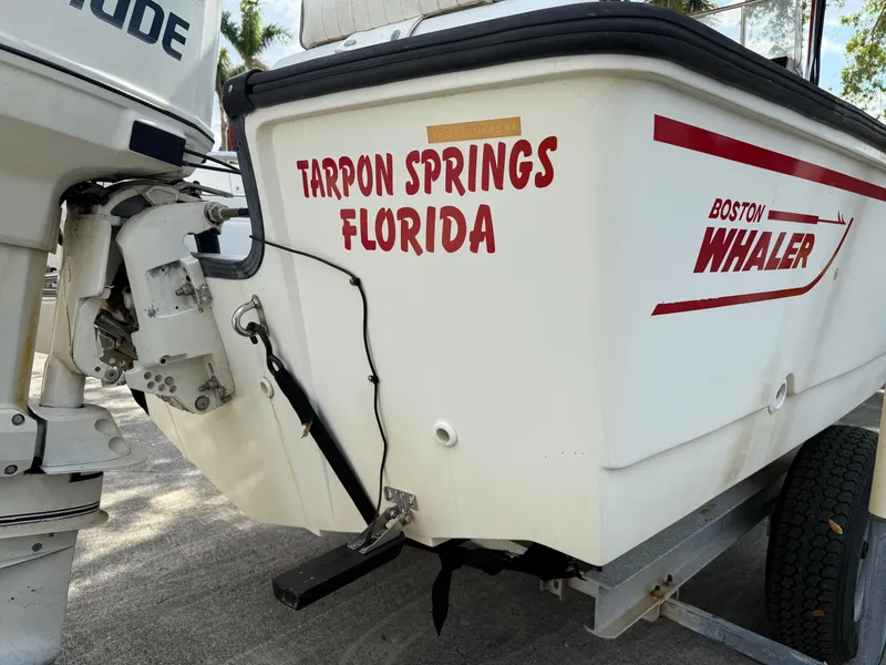 Slide: The Image of 1996 Boston Whaler Outrage 17 boat in Tarpon Springs, Florida, on a trailer. - 9