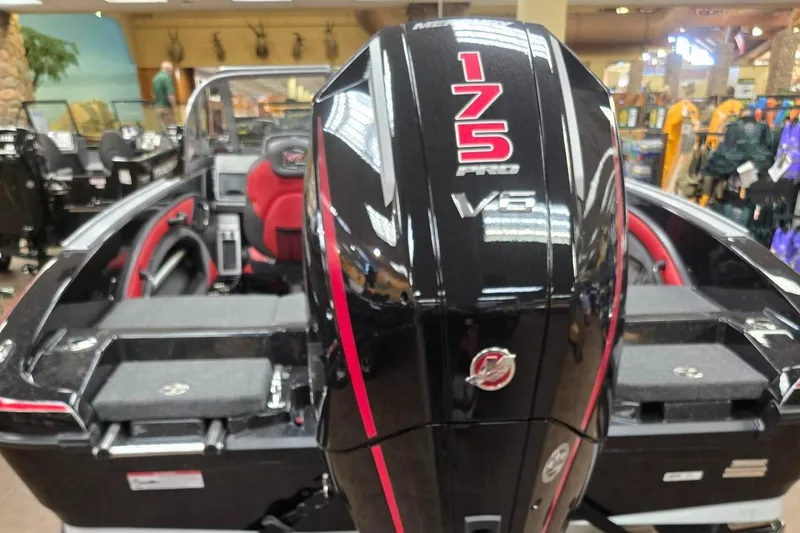 Slide: The Image of 2025 Ranger 1880MS boat with 175 Pro V6 engine displayed indoors. - 2