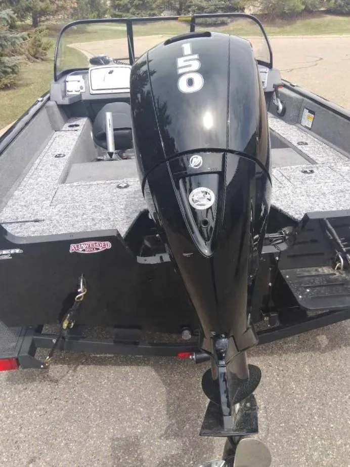 Slide: The Image of 2025 Tracker Pro Guide V-175 Combo boat with a 150 HP outboard motor. - 5