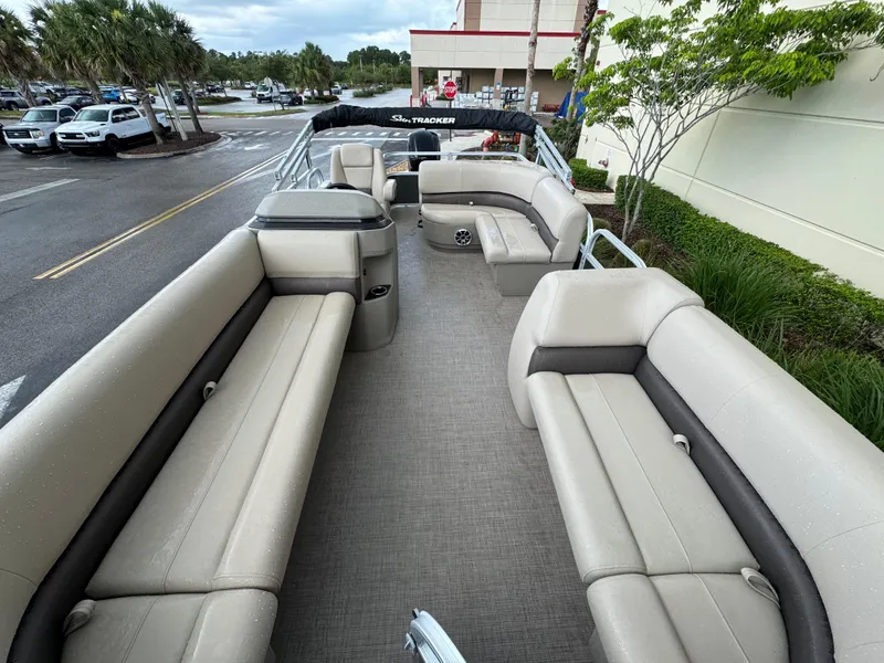 Slide: The Image of 2025 Sun Tracker Party Barge 18 DLX with spacious seating and modern design. - 2