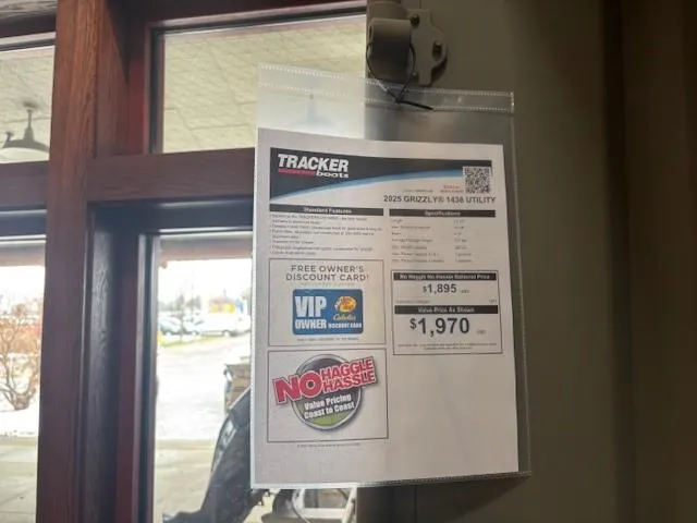 Slide: The Image of 2025 Tracker Grizzly 14 Jon boat price tag displayed indoors. - 2