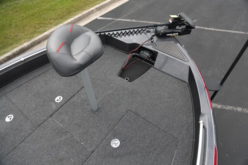 Slide: The Image of 2025 Nitro ZV19 boat deck with seat and trolling motor. - 2