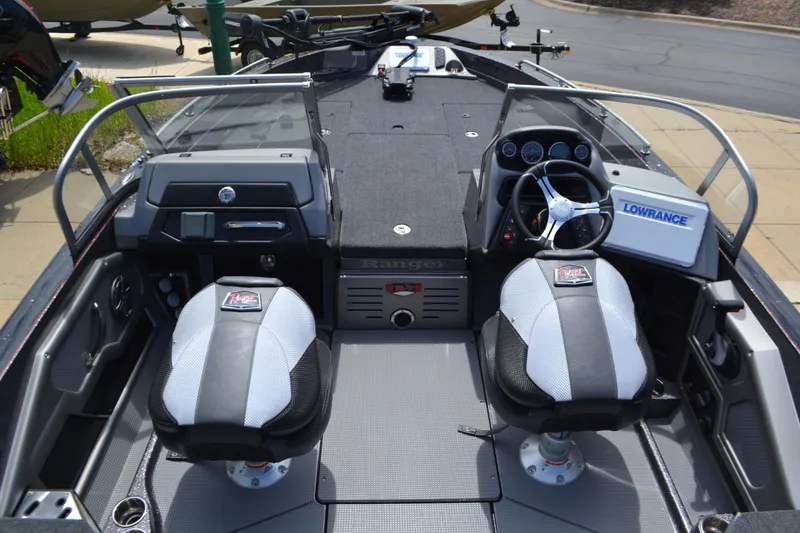 Slide: The Image of 2025 Ranger 620FS Cup Equipped boat interior with dual seats and navigation system. - 4