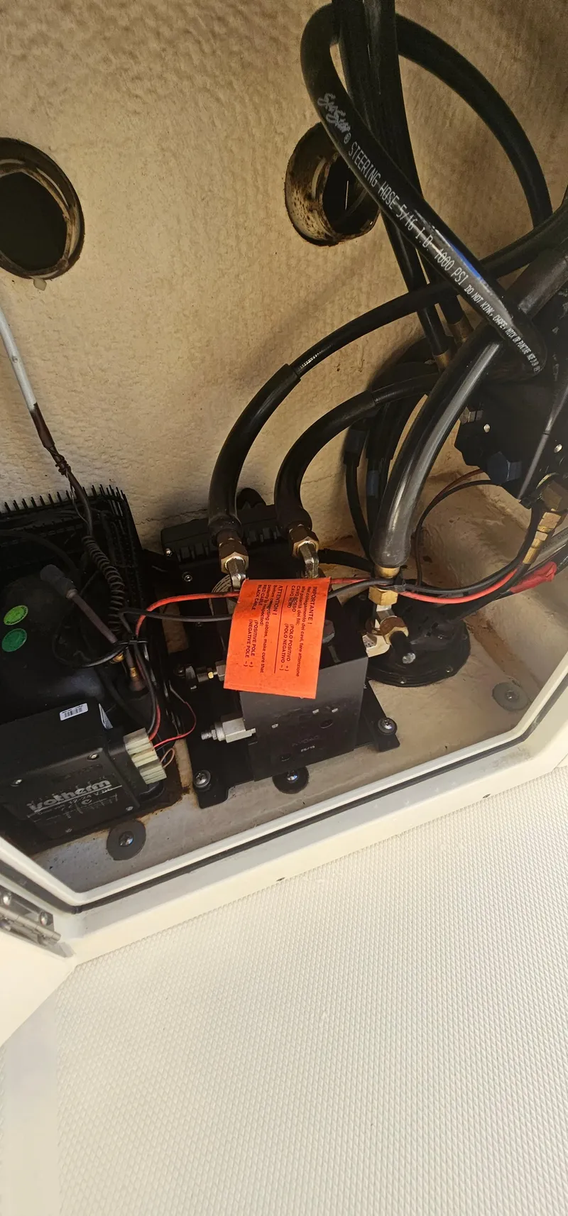 Slide: The Image of 2016 World Cat 320 boat engine compartment with wiring and components. - 36