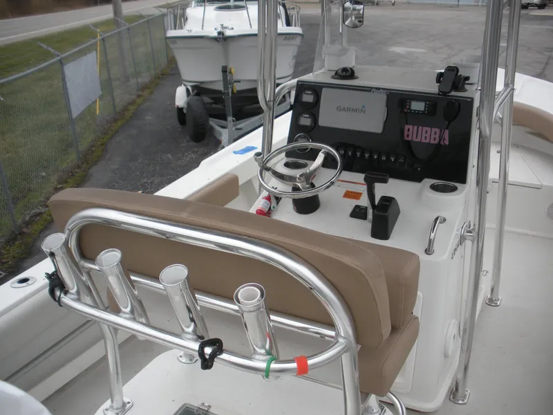 Slide: The Image of 2017 Parker 2100 Special Edition boat console with steering wheel and navigation equipment. - 11