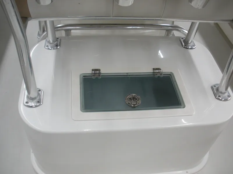 Slide: The Image of Parker 2100 Special Edition 2017 boat livewell with stainless steel fittings and glass lid. - 12