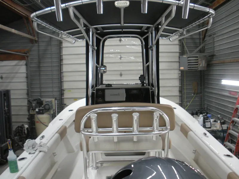 Slide: The Image of 2017 Parker 2100 Special Edition boat interior in a garage setting. - 13