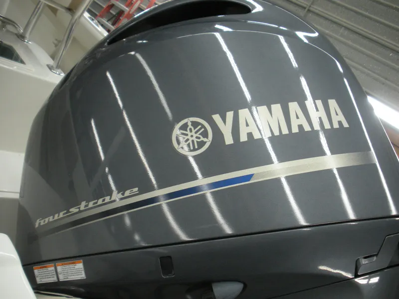 Slide: The Image of Yamaha four-stroke outboard motor on a 2017 Parker 2100 Special Edition boat. - 19