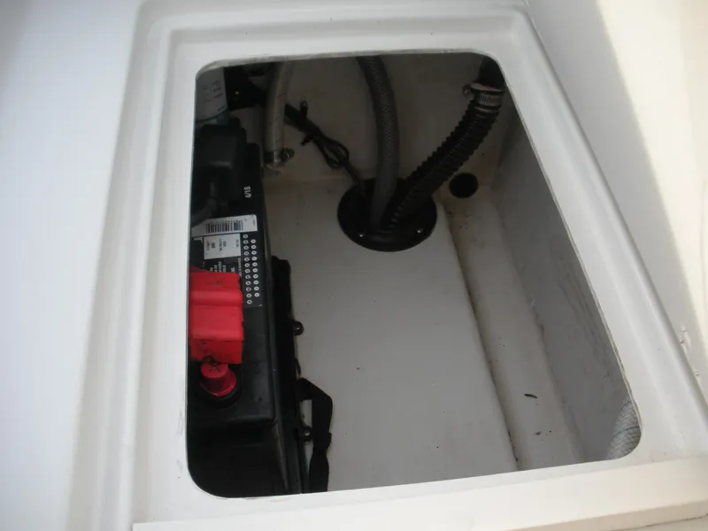Slide: The Image of Battery compartment of 2018 Parker 2120 Sport Cabin boat, showing wiring and connections. - 15