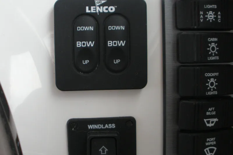 Slide: The Image of Control panel of a 2018 Parker 2120 Sport Cabin boat with Lenco trim tabs. - 9