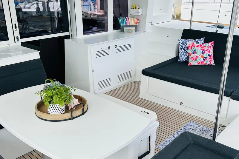 Slide: The Image of Luxurious interior of 2019 Lagoon 450 F Owner's Edition catamaran with stylish seating and decor. - 17