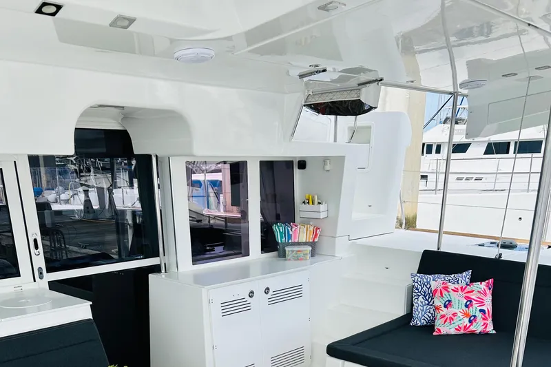 Slide: The Image of Interior of 2019 Lagoon 450 F Owner's Edition yacht with modern seating and decor. - 18