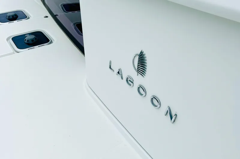 Slide: The Image of Lagoon 450 F Owner's Edition 2019 yacht logo on white surface. - 35