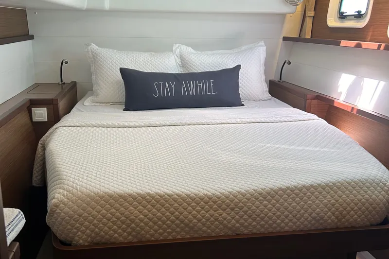 Slide: The Image of Luxurious bedroom in 2019 Lagoon 450 F Owner's Edition yacht with cozy bedding. - 36
