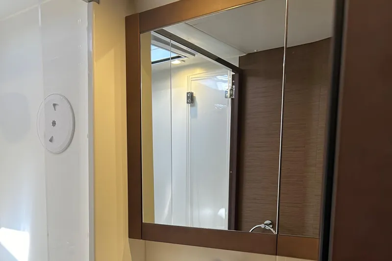 Slide: The Image of Mirror in Lagoon 450 F Owner's Edition 2019 yacht bathroom, reflecting shower area. - 40