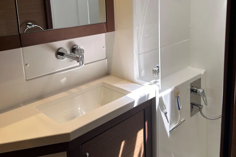 Slide: The Image of Luxurious bathroom in 2019 Lagoon 450 F Owner's Edition yacht, featuring modern sink and fixtures. - 41