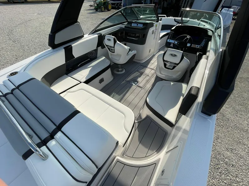 Slide: The Image of 2025 Chaparral 270 OSX boat interior with modern seating and sleek design. - 48