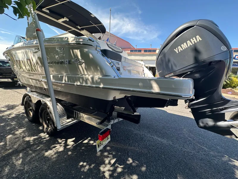 Slide: The Image of 2023 Chaparral 270 OSX boat with Yamaha engine on a trailer. - 10
