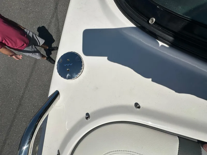 Slide: The Image of 2023 Chaparral 270 OSX boat deck with visible fittings and shadow. - 34