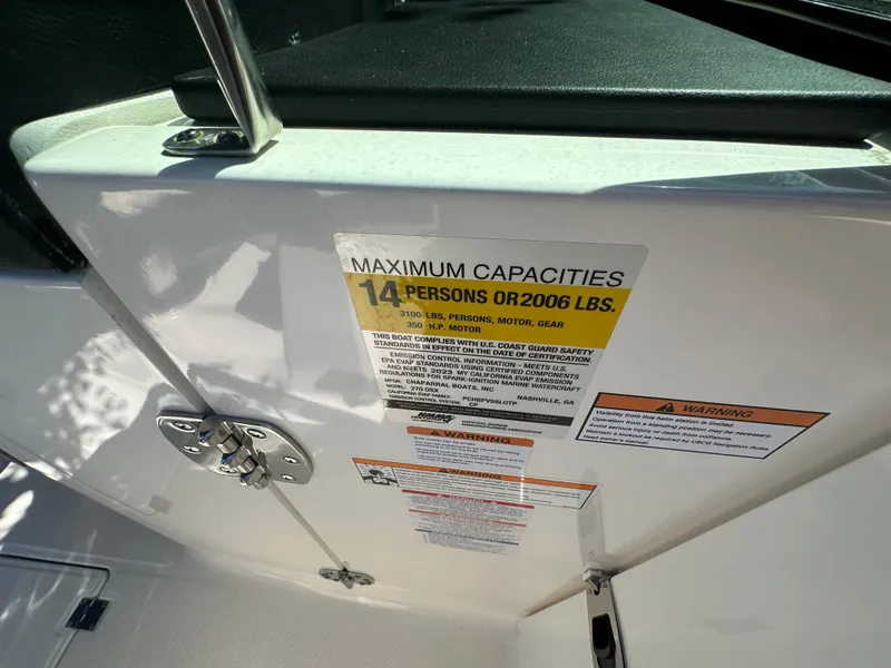 Slide: The Image of 2023 Chaparral 270 OSX boat capacity label, maximum 14 persons or 2006 lbs. - 38