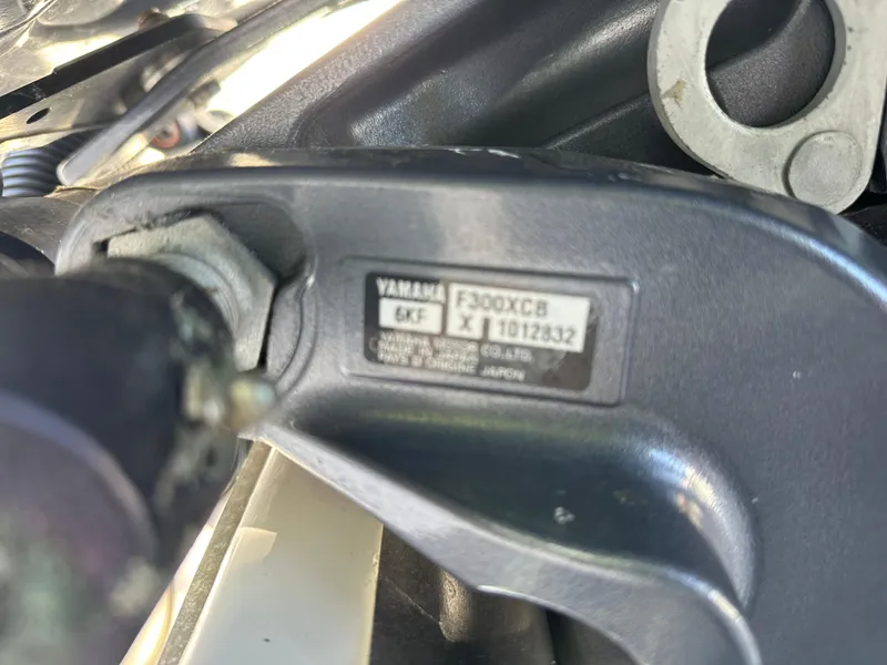 Slide: The Image of Close-up of Yamaha F300XCB engine part on 2023 Chaparral 270 OSX boat. - 45