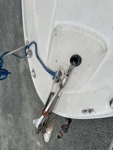 Slide: The Image of 2006 Bayliner 265 SD boat anchor and rope on deck. - 6