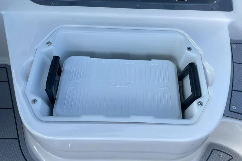 Slide: The Image of Built-in cooler on 2025 Chaparral 270 OSX boat, featuring convenient storage. - 33